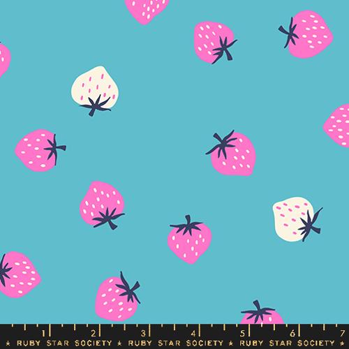 Pattern of pink strawberries on a blue background with a ruler at the bottom.