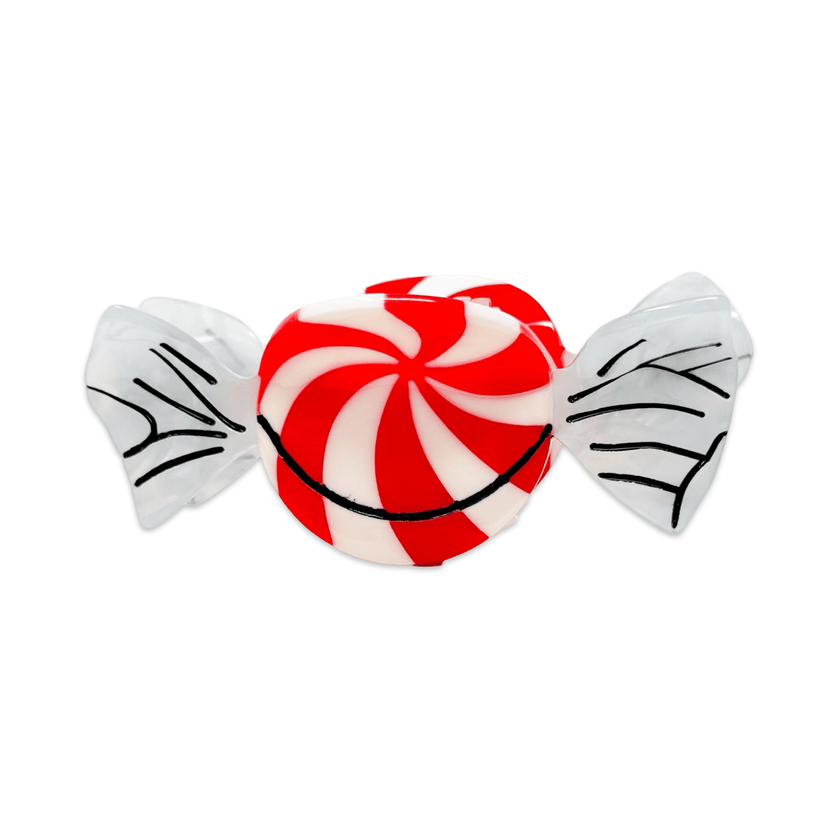 A novelty hair claw clip shaped like a peppermint candy, featuring a red and white swirled center with black line details and white wings with black line patterns on either side, set against a plain white background. Jenny Lemons hair accessory