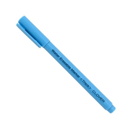 Blue water erasable marker on a white background