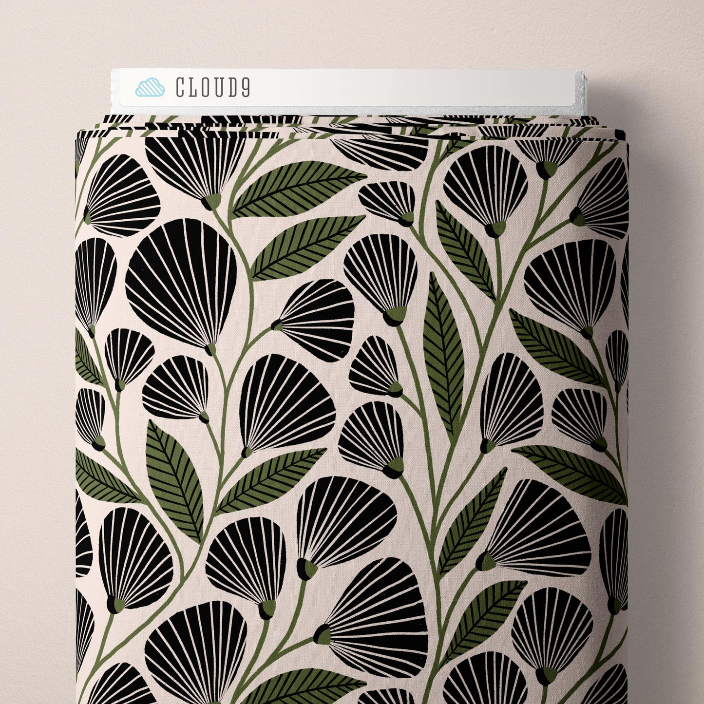Fabric with black and green leaf pattern on a beige background, branded 'Cloud9'.