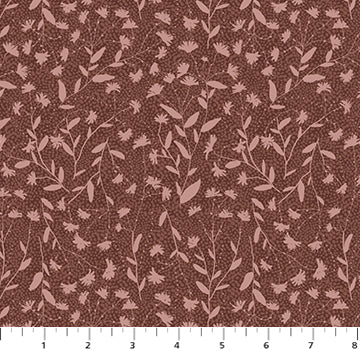 Floral pattern fabric swatch on a brown background