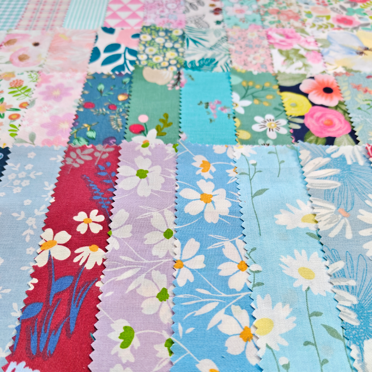 Quilting Fabric: 40-Piece Cotton 2.5'' x 10'' Mini Strips - Blossom Breeze Collection