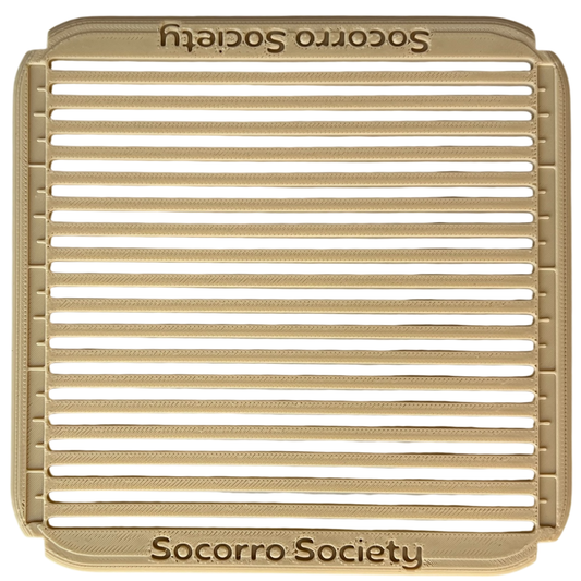 Beige metal grill with 'Socorro Society' branding on a white background