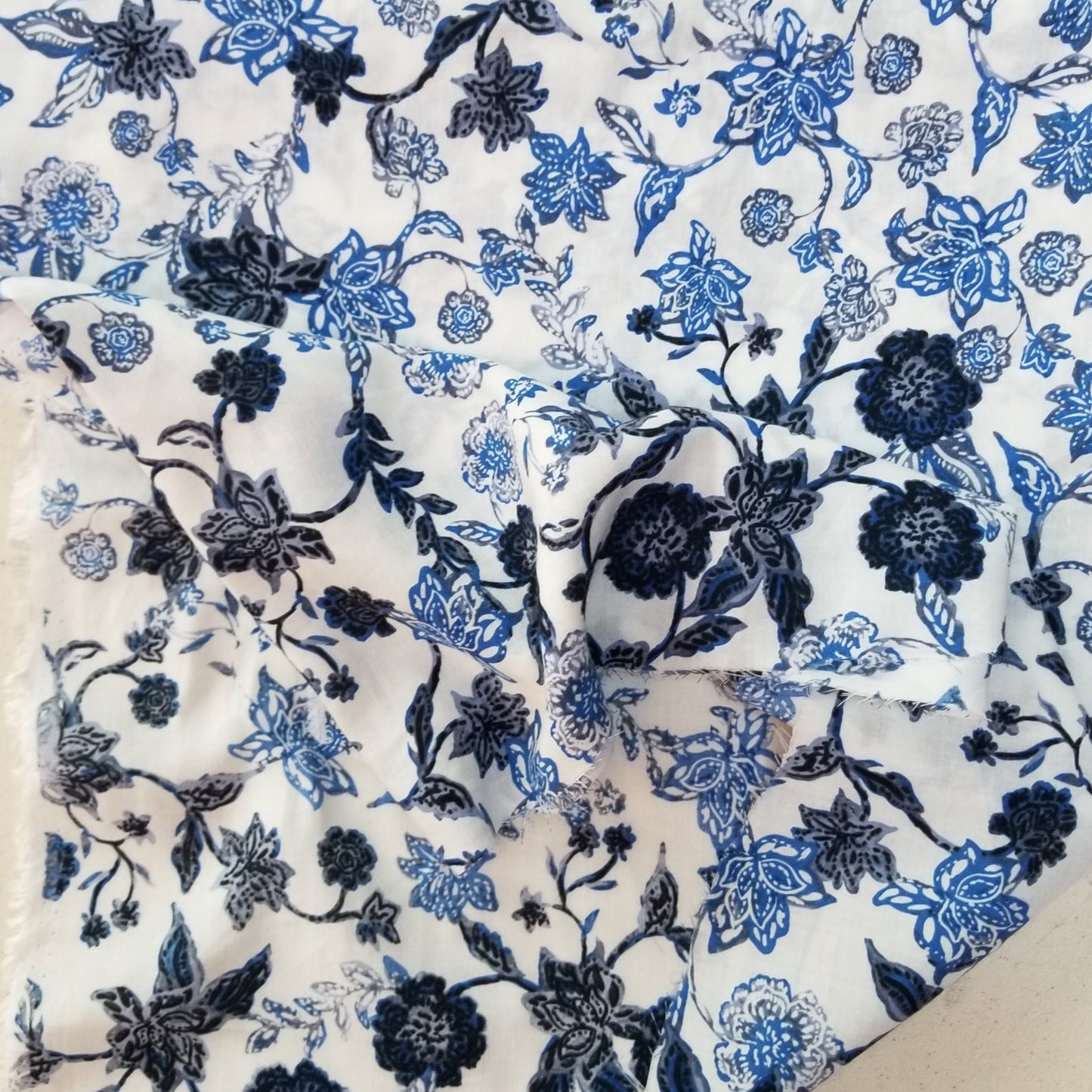 Designer LA Deadstock Ivory and Scattered Blue Floral Rayon Challis Woven-by the yard