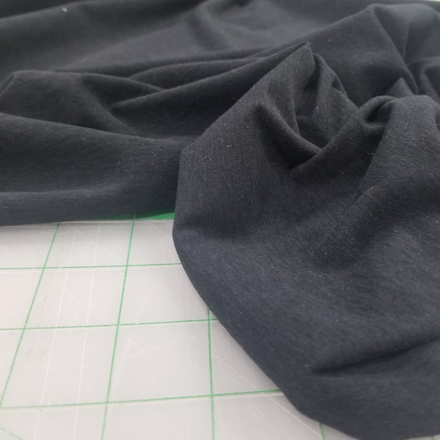 peach performance black nit sample yardage LA finch fabrics