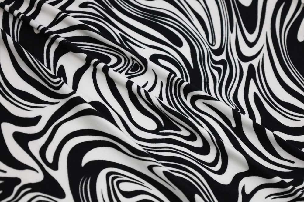 Retro Swirls Double Brushed Black Poly Spandex Knit- Sold by the yard